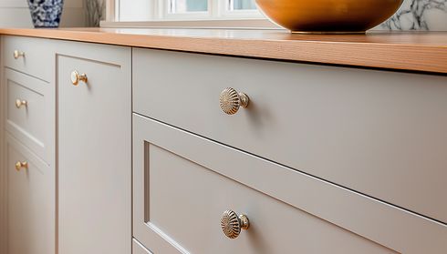 Close‑up of decorative cabinet drawer knobs